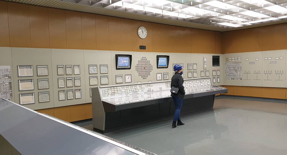 A still taken during location scouting that shows a controll room from an abandoned power plant